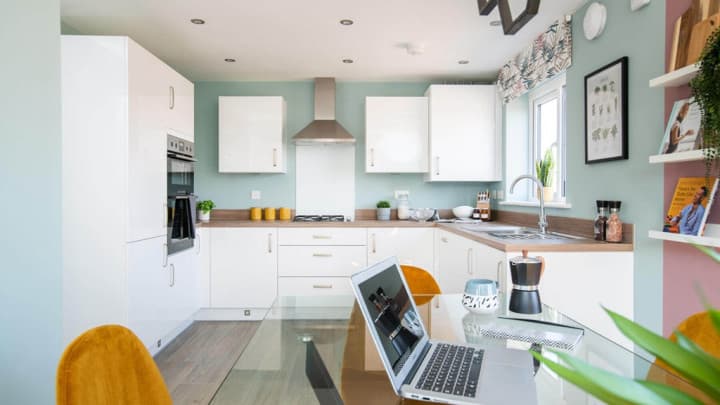 The bright and airy kitchen is perfect for entertaining family and friends